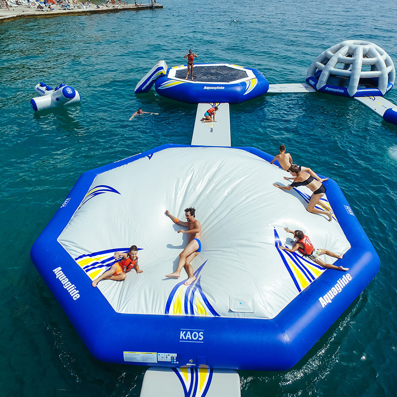 People enjoying the large Kaos platform in the sea.