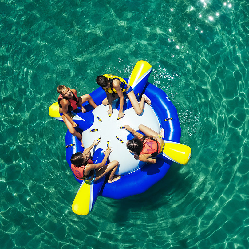 People enjoy the Rockit Jr on clear, turquoise waters.