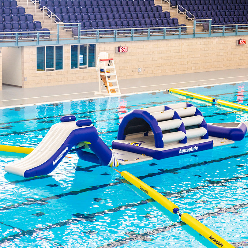 Challenge Track S: Small inflatable obstacle course on a pool with nearby bleachers.