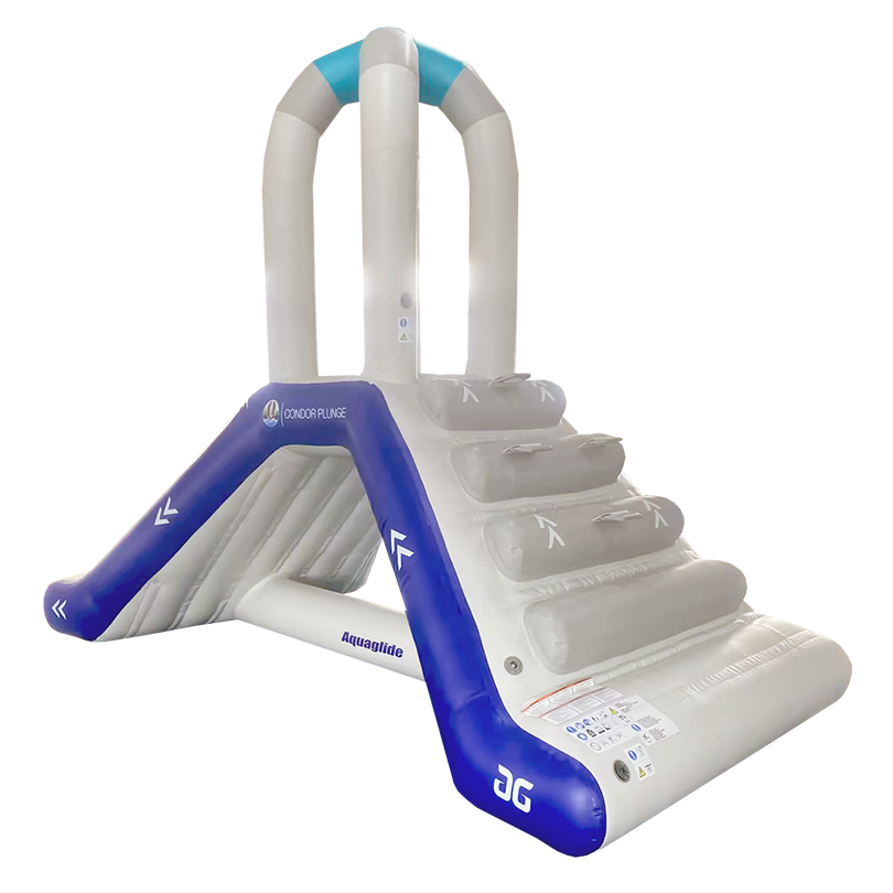 Penguin Plunge inflatable slide with gray steps, blue sides, and tall arched handles.