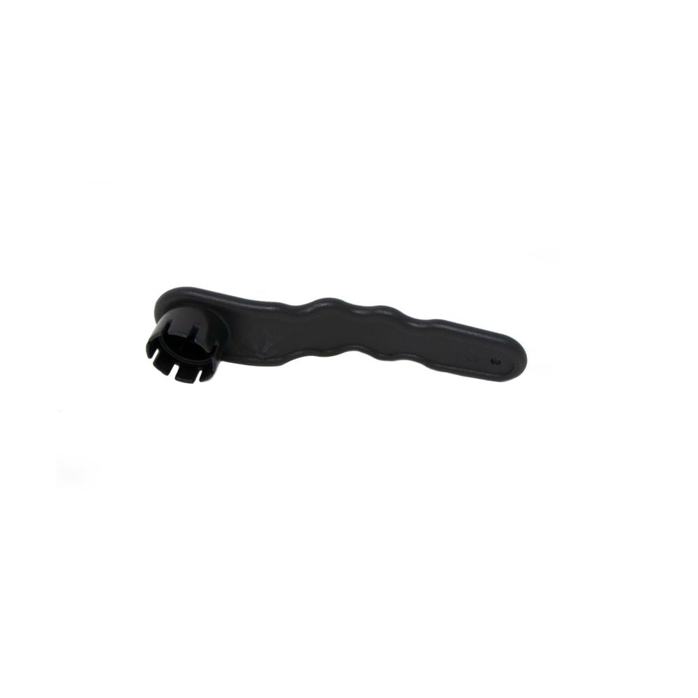 Black plastic valve wrench with a multi-notch head and textured handle.