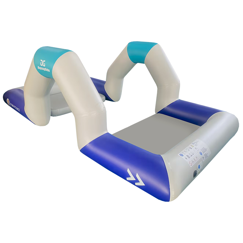 Puma Pounce inflatable obstacle with white arches and blue accents on a gray base.