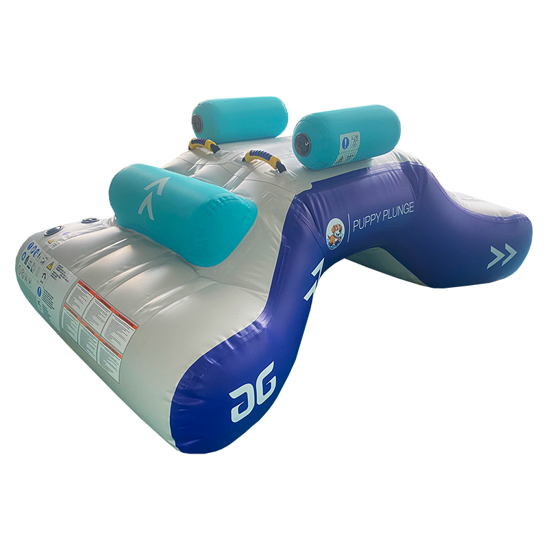 Puppy Plunge inflatable slide with teal rollers and blue sides on a white base.