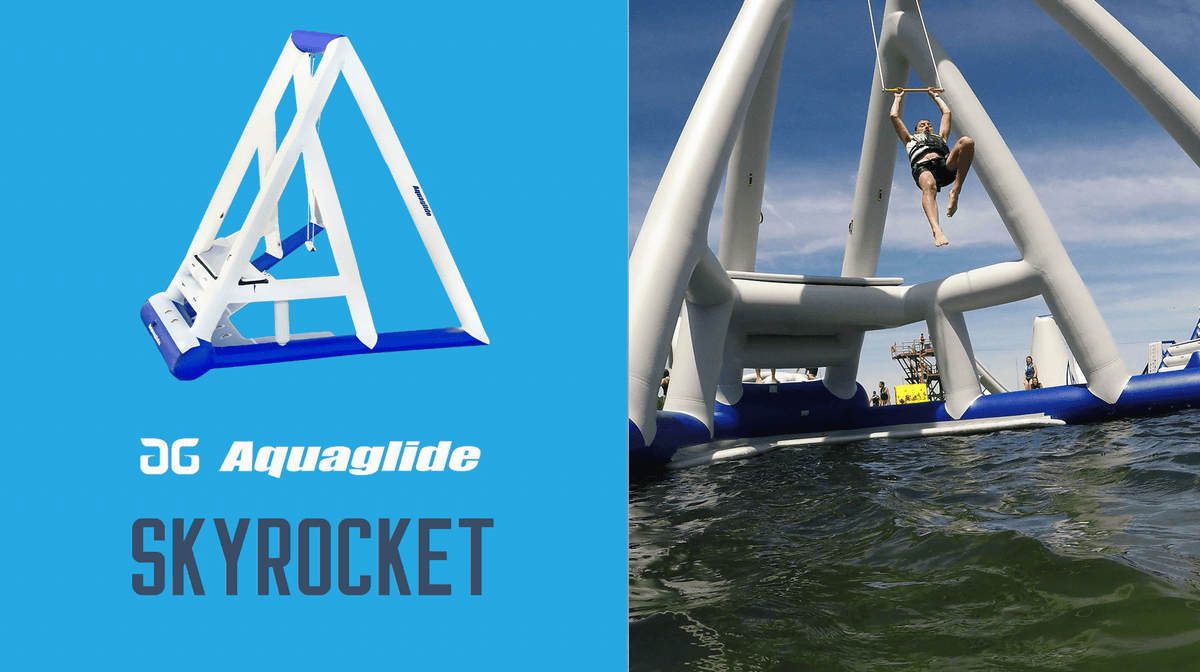 Person swinging over water on the Skyrocket inflatable structure.