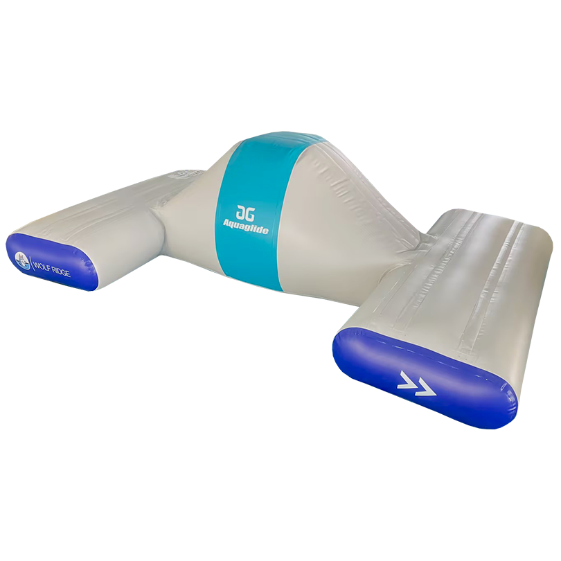 Wolf Ridge inflatable water obstacle with teal peak and blue ends on a white base.